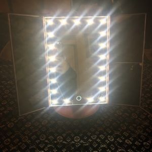 Pink led light mirror stand